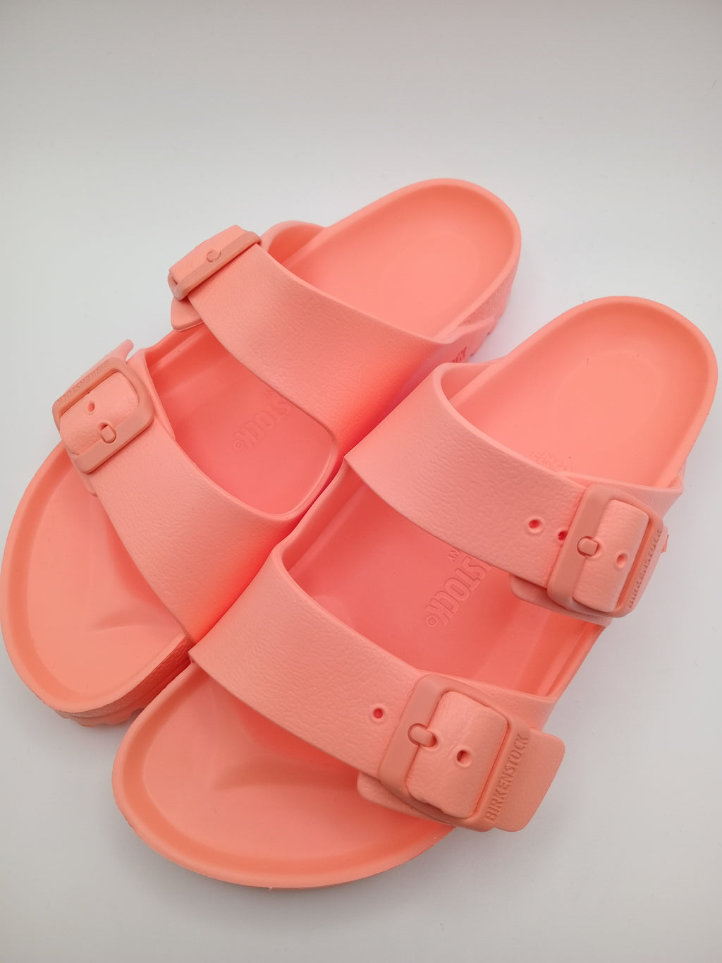 Sandálias Birkenstock Arizona EVA originais com fivelas ajustáveis, chinelos confortáveis de verão para homem e mulher, cor Coral Peach Rosa Rose Salmon, material ultraleve e resistente à água, calçado ideal para praia e lazer