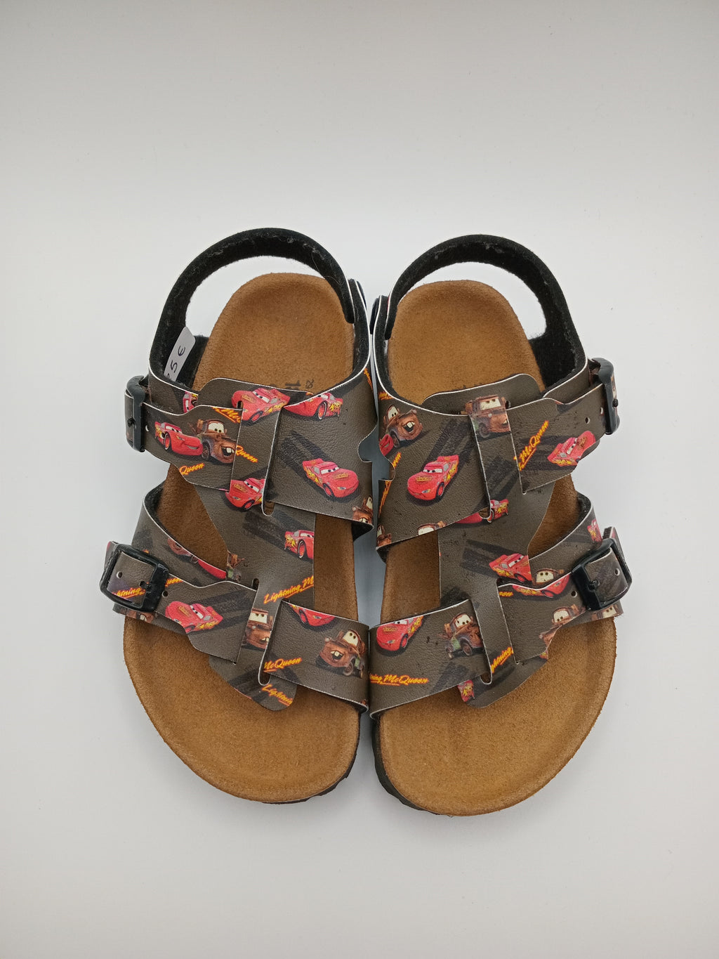 SANDÁLIA INFANTIL BIRKENSTOCK CARROS DISNEY PRETO VERMELHO COURO FIVELA PRETO